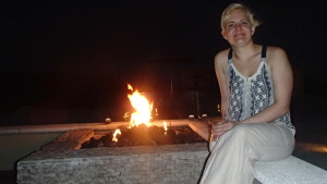 Sitting at one of the fire pits at night
